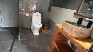 Shower, slippers, towels, soap