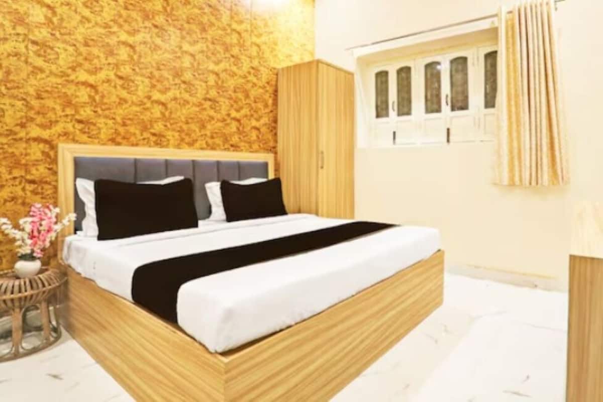 Chambre Deluxe | Fer et planche Ă repasser, accĂšs au Wi-Fi (inclus), literie fournie