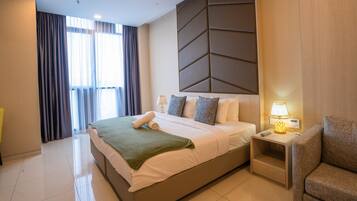 Deluxe Studio, City View | Desk, iron/ironing board, free WiFi, bed sheets