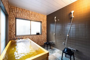 Deluxe Villa, Garden View | Bathroom | Separate tub and shower, spring water tub, free toiletries, hair dryer