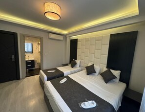 Superior Triple Room | Minibar, in-room safe, soundproofing, free WiFi