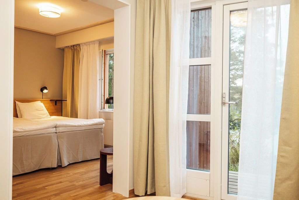 Juniorsvit - balkong - sjöutsikt | Gratis wi-fi och sängkläder