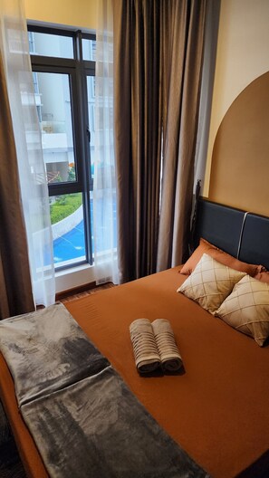 2 室のベッドルーム、アイロン / アイロン台、WiFi、ベッドシーツ