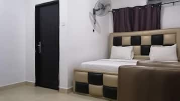 Deluxe Room, Balcony, City View | Desk, laptop workspace, free WiFi