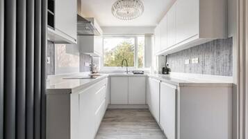 Apartment | Private kitchen | Fridge, microwave, oven, stovetop