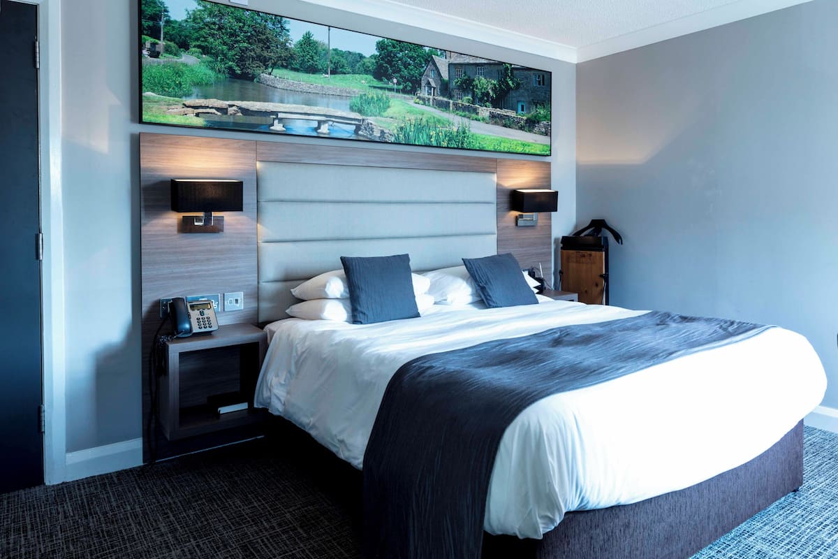 Luxe beddengoed, een bureau, een laptopwerkplek, gratis wifi