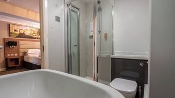 Family Room | Premium bedding, desk, laptop workspace, free WiFi