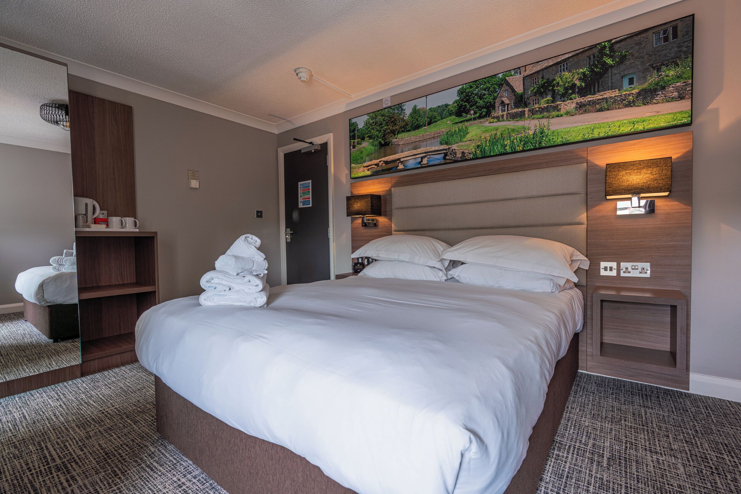 Premium bedding, desk, laptop workspace, free WiFi