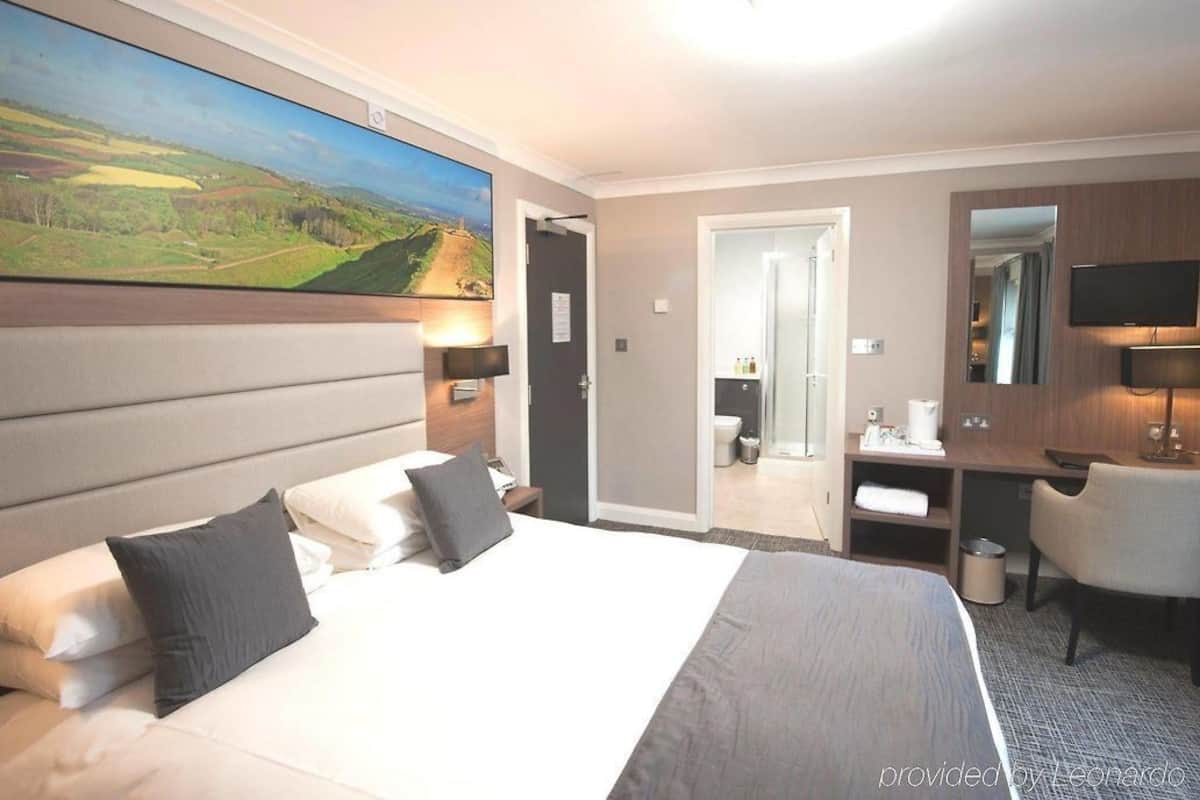 Luxe beddengoed, een bureau, een laptopwerkplek, gratis wifi