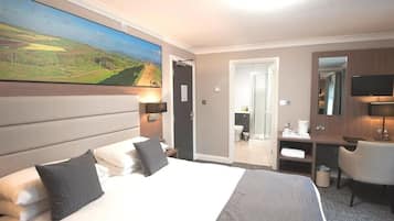 Premium bedding, desk, laptop workspace, free WiFi