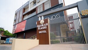 The entrance to Alokah Kashi Hotel with a gated entrance and a signboard. - Alokah Kashi (Varanasi)