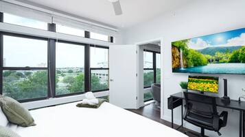 1 bedroom, desk, iron/ironing board, travel crib