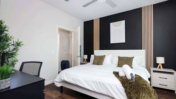 1 bedroom, desk, iron/ironing board, travel crib