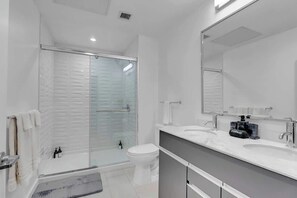 Shower, hair dryer, shampoo