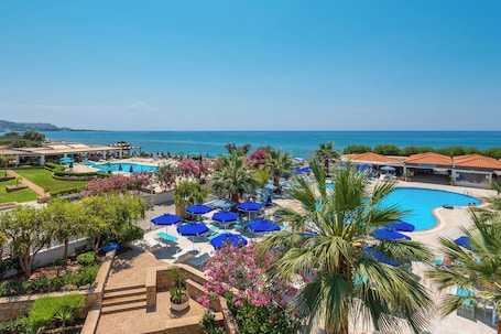 Seasonal outdoor pool, open 8:00 AM to 8:00 PM, pool umbrellas. Elvita Beach Hotel