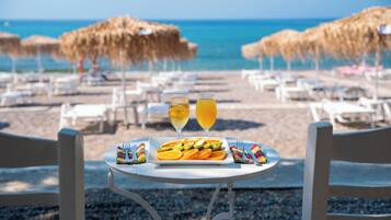 Beach nearby, black sand, sun-loungers, beach umbrellas