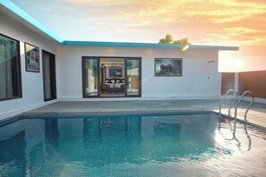 Family Room | 1 bedroom, in-room safe, individually decorated, individually furnished