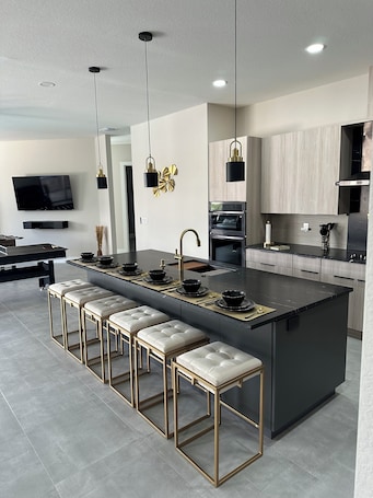 Microwave, oven, stovetop, dishwasher. Spacious 4-bedroom house in gorgeous Cape Coral with WiFi, AC
