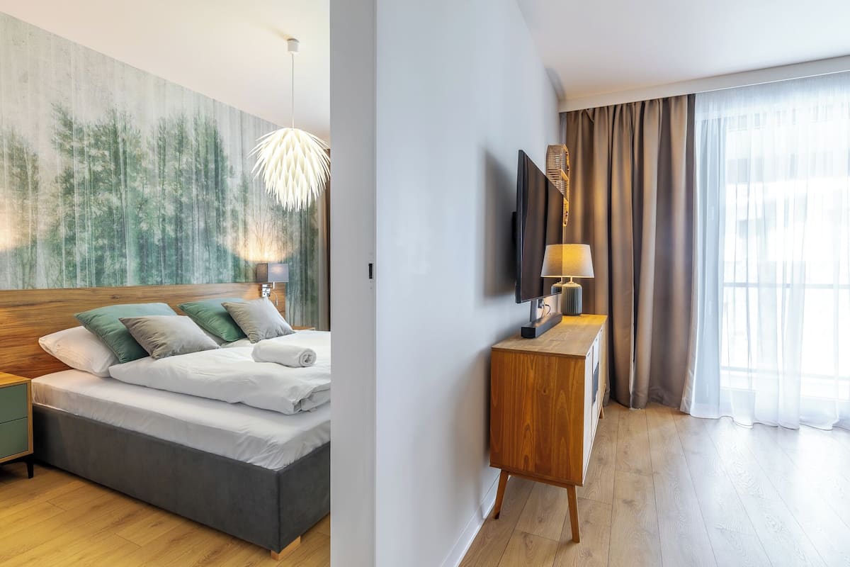 Departamento, balcón | 2 habitaciones, tabla de planchar con plancha y wifi gratis
