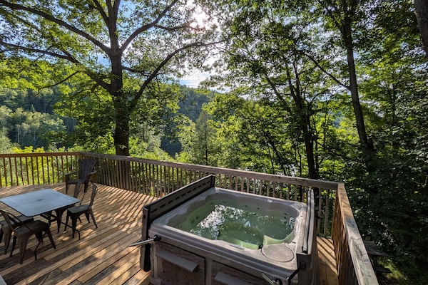 Cottage balcony with hot tub