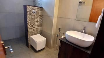 Shower, towels, soap, shampoo