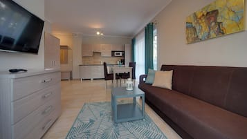 Apartment, Kochnische | Wohnbereich | Flachbildfernseher