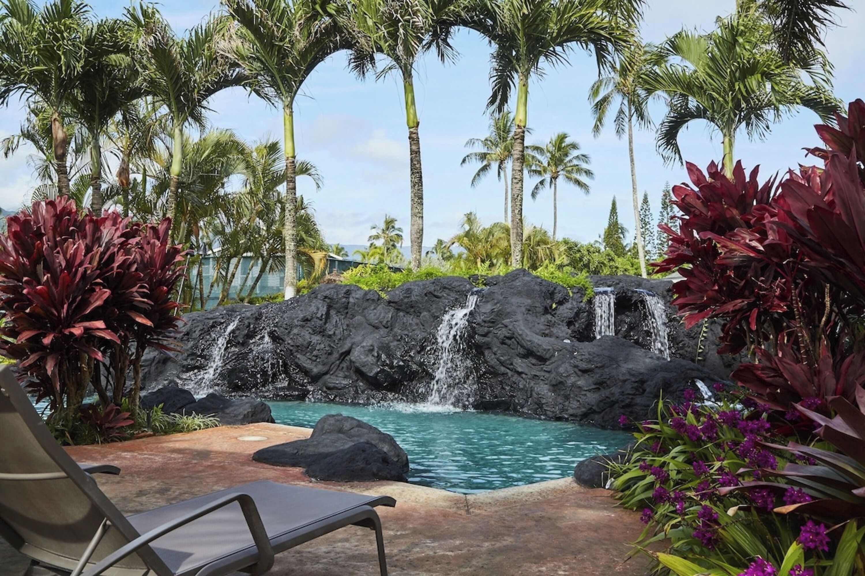 2 outdoor pools, open 9:00 AM to 10:00 PM, pool umbrellas, pool loungers