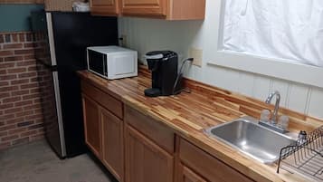 Fridge, microwave, coffee/tea maker, highchair