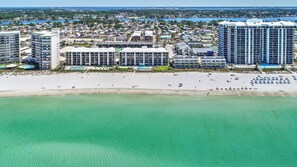 A coastal hotel with multiple buildings, a sandy beach, and a clear view of the ocean. - FREE Golf & Perks! Mariner West 103, Walk-In Shower, Gulf Front Pool & Grill! (Panama City Beach)