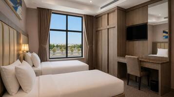 Apartment, 2 Bedrooms | Premium bedding, minibar, individually decorated, laptop workspace