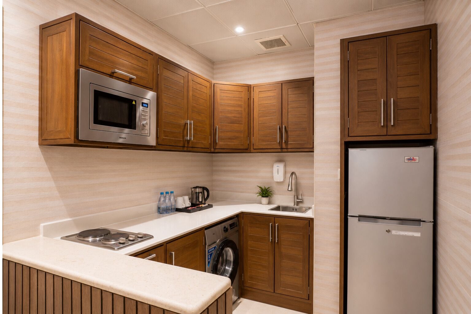 Apartment, 2 Bedrooms | Private kitchen | Microwave, stovetop, electric kettle, cookware/dishes/utensils