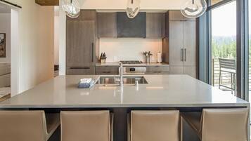 Condo, 4 Bedrooms | Private kitchen | Coffee/tea maker