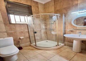 Free toiletries, slippers, towels - OIKOS Apartment (Kigali)