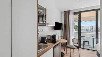 Comfort Single Suite with Balcony | Private kitchen | Fridge, stovetop, espresso maker, electric kettle