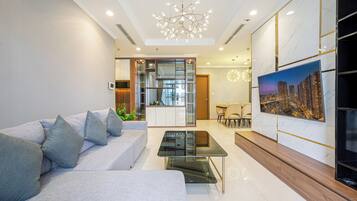 Premier Apartment, 3 Bedrooms, Balcony, City View | Living area | 43-inch Smart TV with cable channels