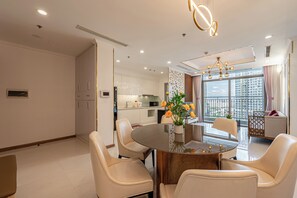 Premier Apartment, 3 Bedrooms, Balcony, City View | Living area | 43-inch Smart TV with cable channels