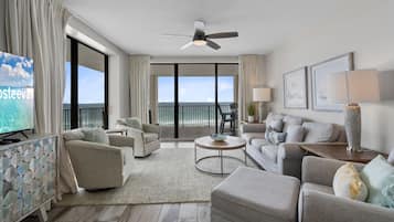 Family Condo, 3 Bedrooms, Balcony, Beach View | Living room | 55-inch Smart TV with cable channels