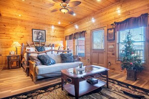 Télévision, cheminée, baby-foot, livres