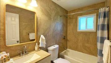 Hair dryer, towels, soap, shampoo