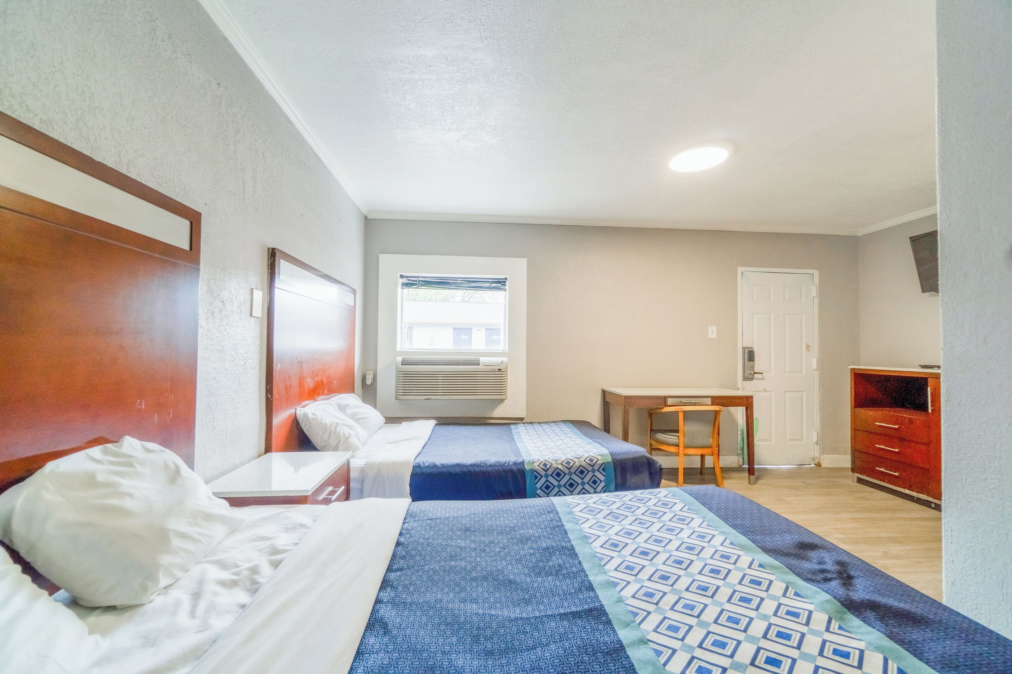 Room, 2 Double Beds, Non Smoking | In-room safe, desk, free WiFi, bed sheets