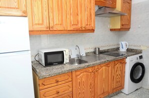 Fridge, microwave, coffee/tea maker, electric kettle