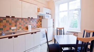 Apartment, City View | Private kitchen | Coffee/tea maker, electric kettle