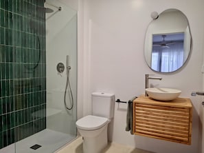 Shower, hair dryer, towels, soap