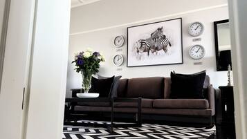 Deluxe Studio, Balcony, Sea View | Living area | 46-inch Smart TV with digital channels, Netflix, streaming services