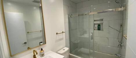 Hair dryer, towels, soap, toilet paper