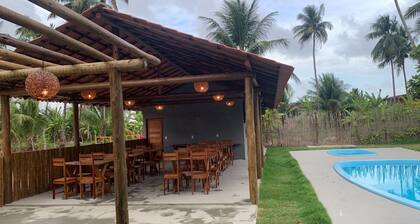 PE NA AREIA INN