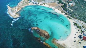 On the beach, white sand