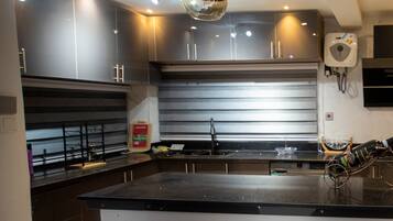 Apartment | Private kitchen | Fridge, microwave, oven, stovetop