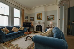 TV, fireplace - Edwardian Beach Villa in Whitehead, Beach Front Period Edwardian Villa (Whitehead)