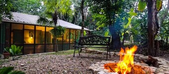 Private forest view cabin w/AC, 2 beds-restaurant and car rental on site.